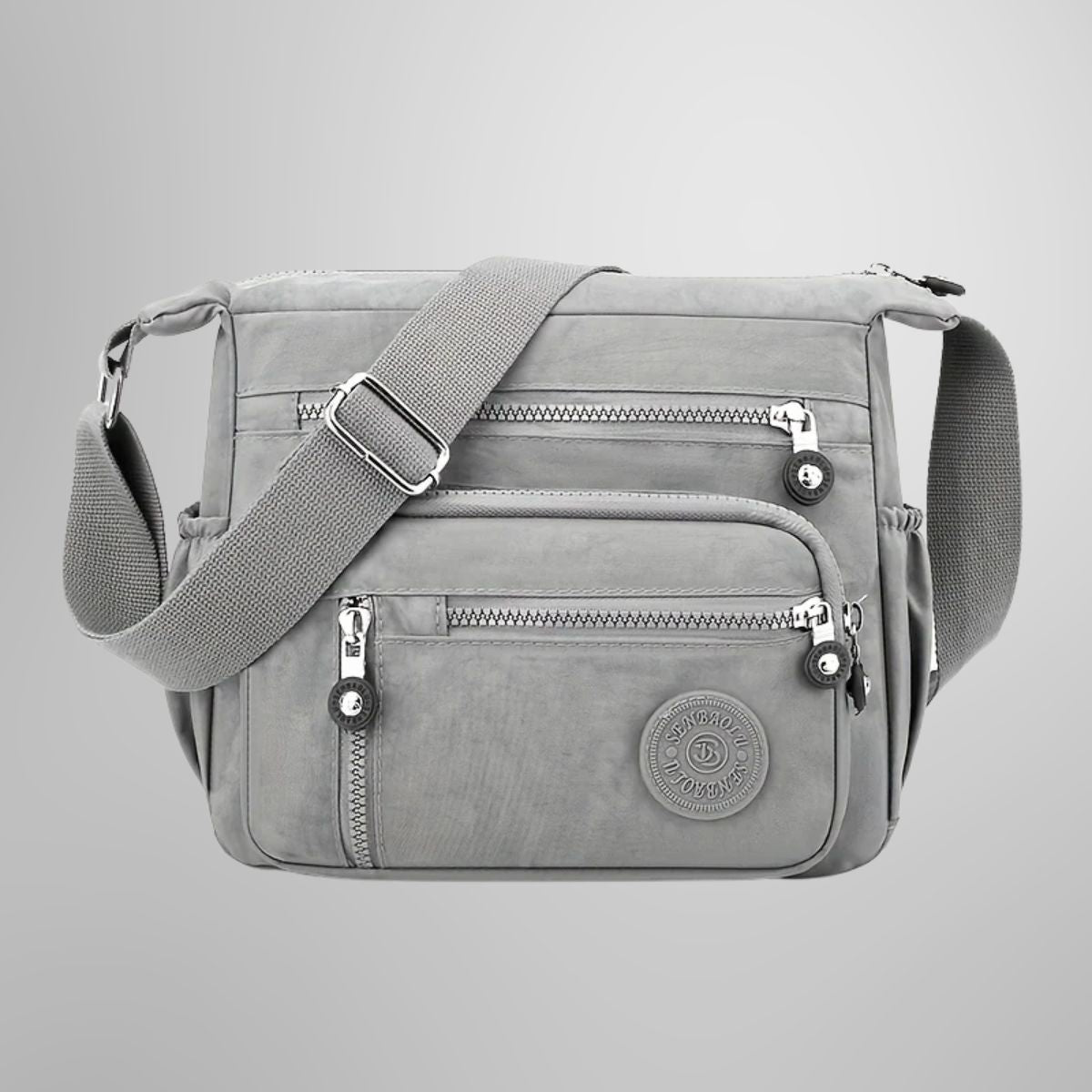 Evelisse modern shoulder bag in grey, front view with zip pockets