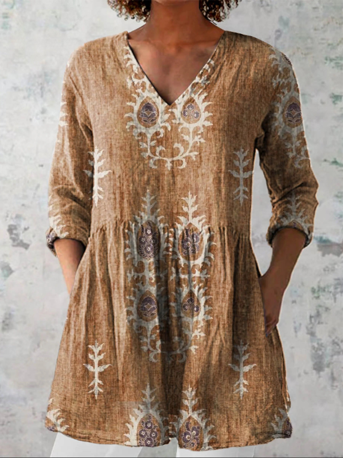 Elise long V-neck blouse in yellow with printed medallions, front view