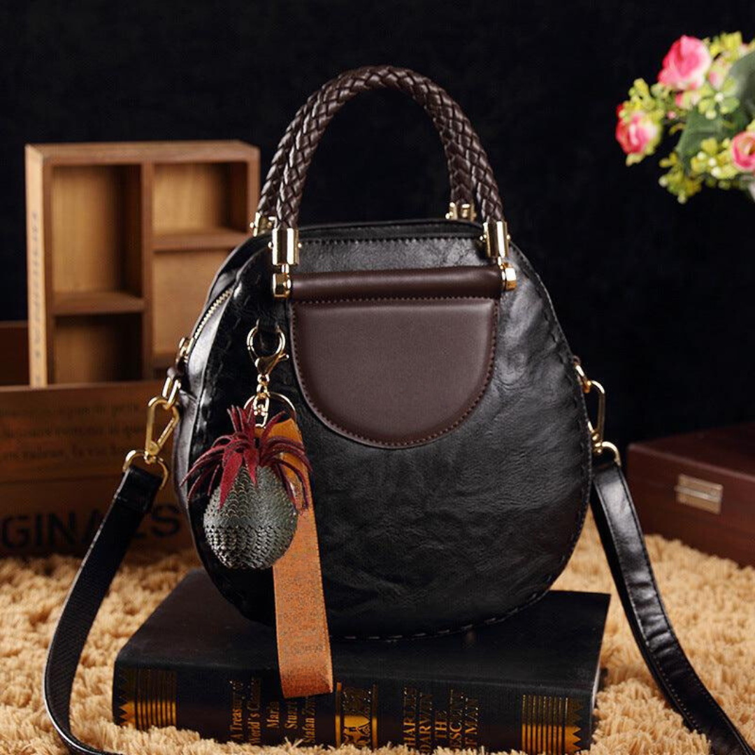 Naelle crossbody bag in black, front view with contrast flap