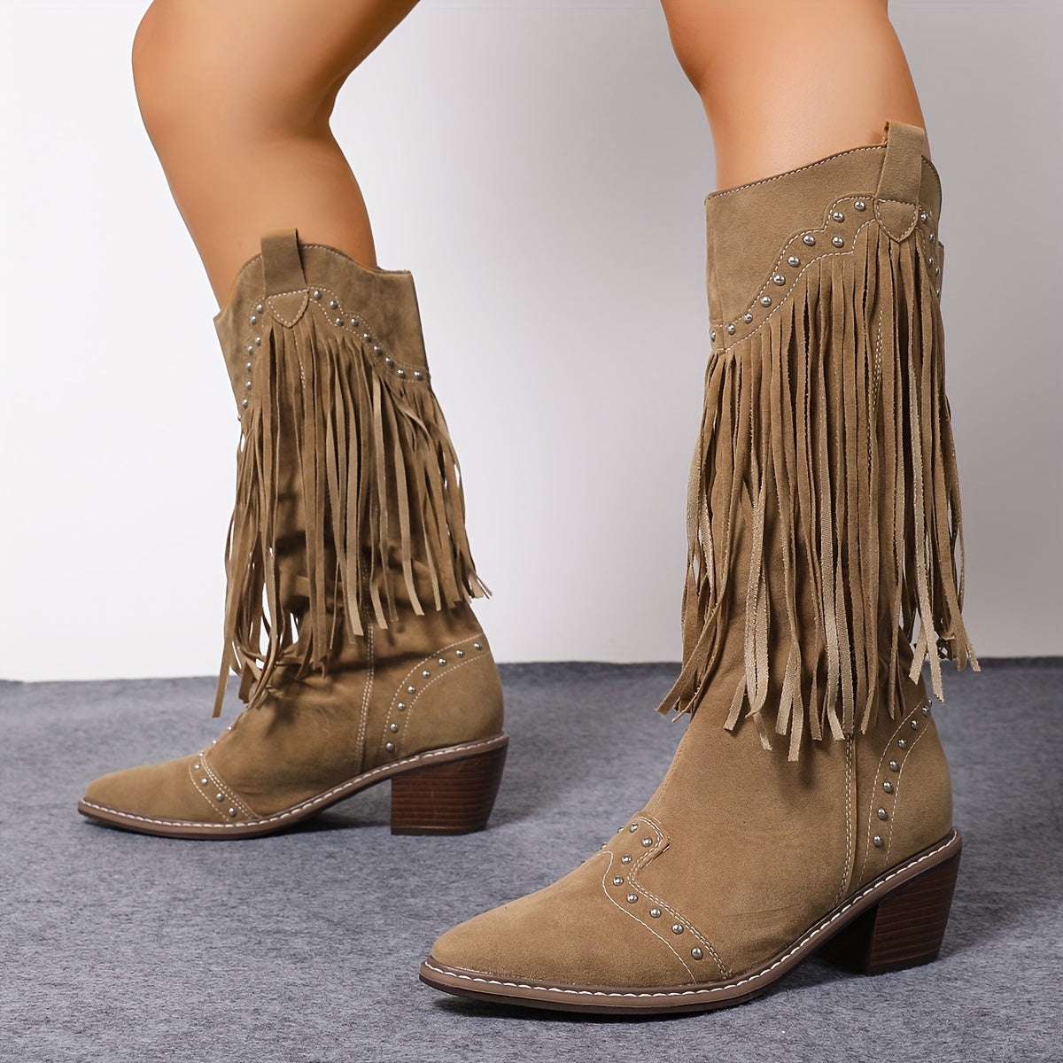 Marigold tassel-studded boots in camel, standing front view