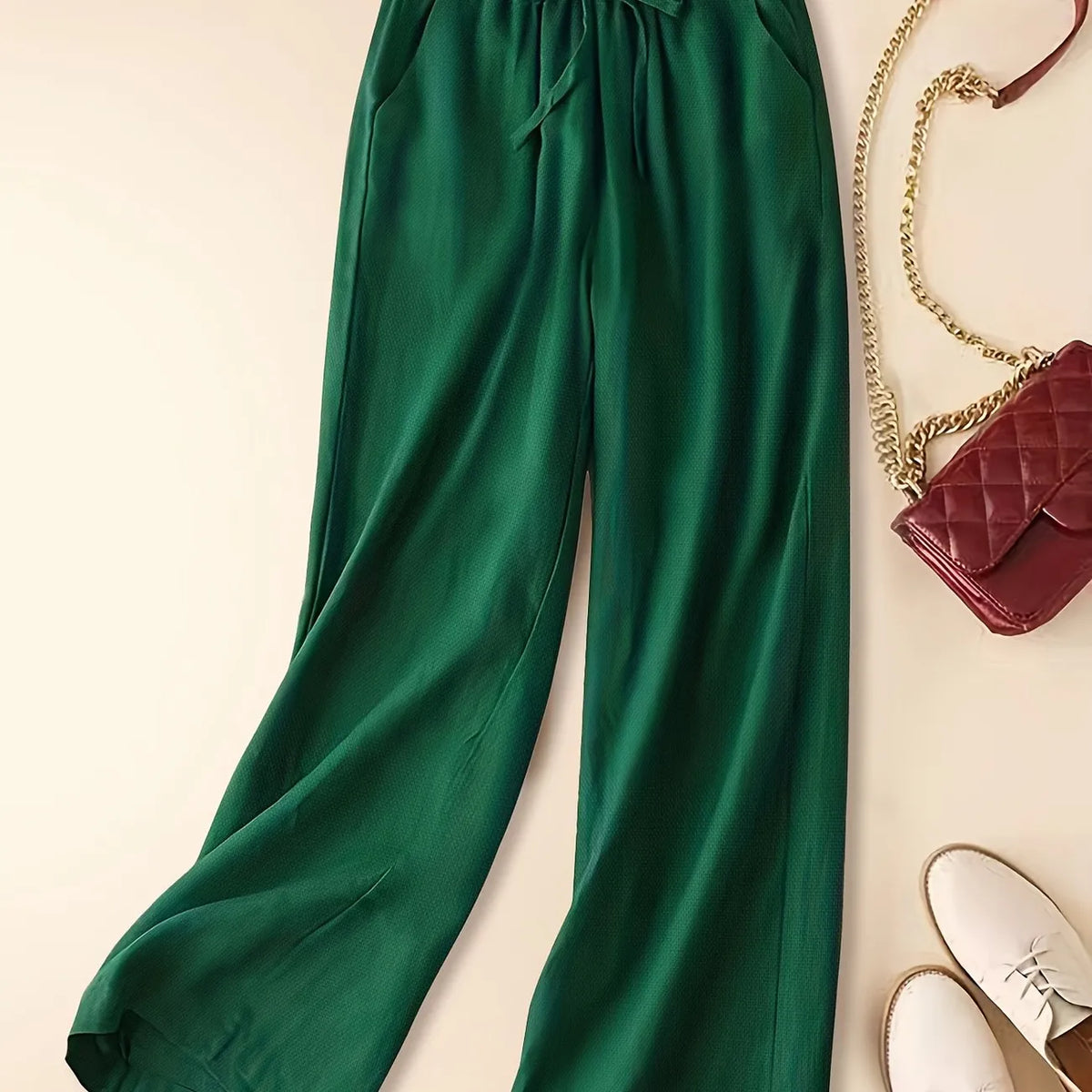 Imara wide-leg drawstring trousers in green, flat front view