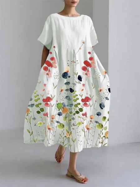 Henrietta summer dress in white with meadow floral print, full-length front view