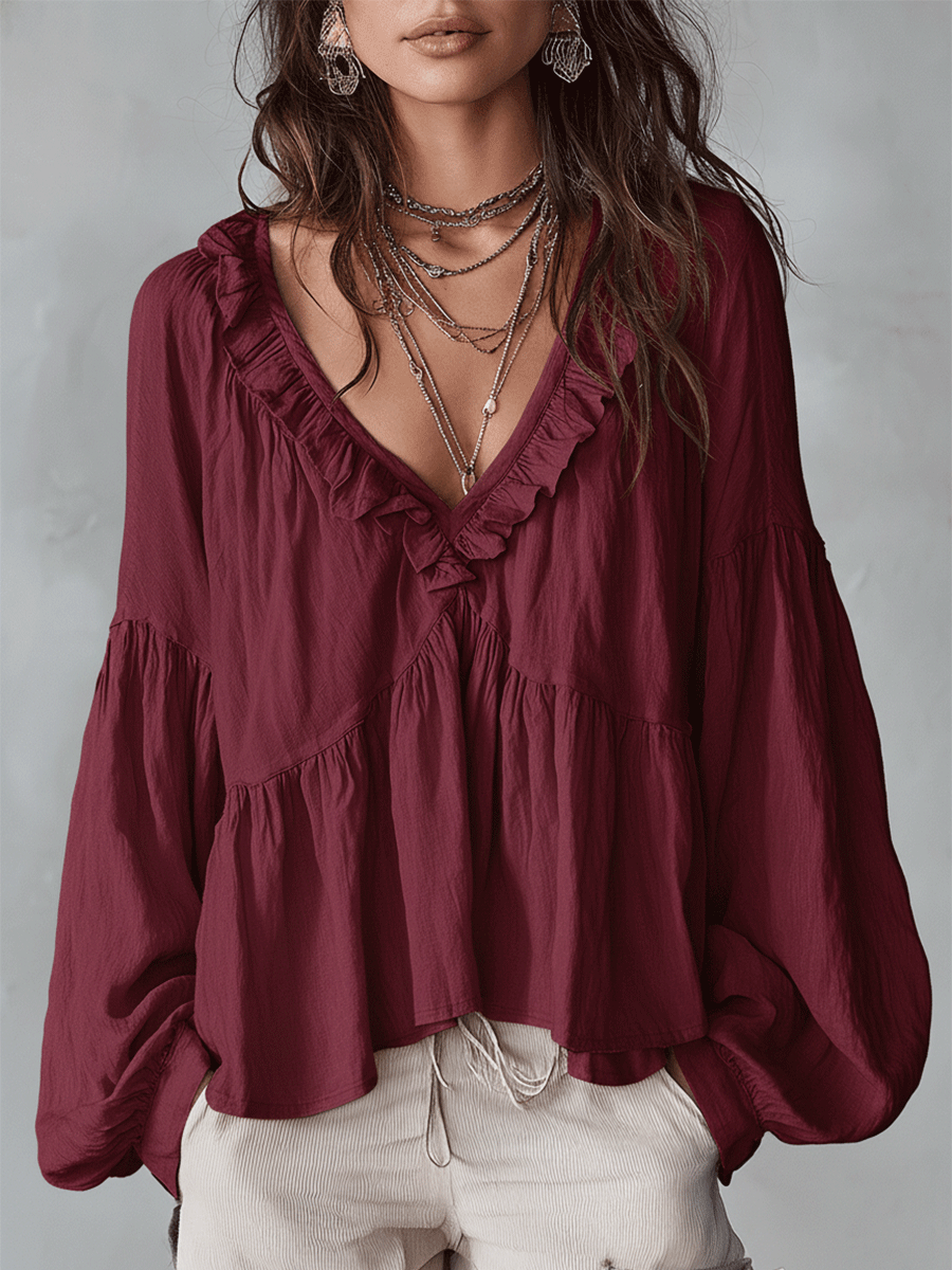 Vintage-inspired bohemian blouse in burgundy, front view on model