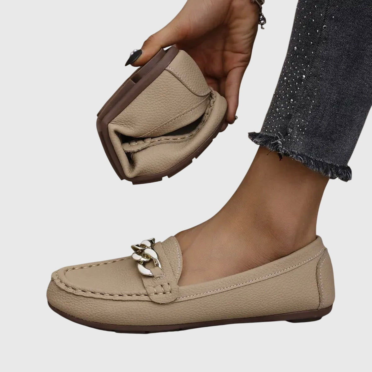 Madeleine loafers in beige, soft upper folded in hand