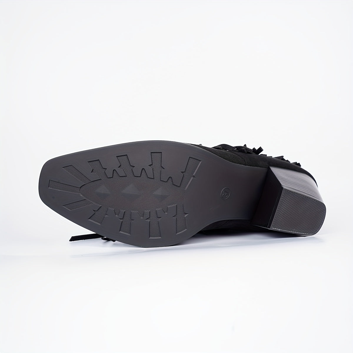 Vespa western boot in black, treaded rubber sole view