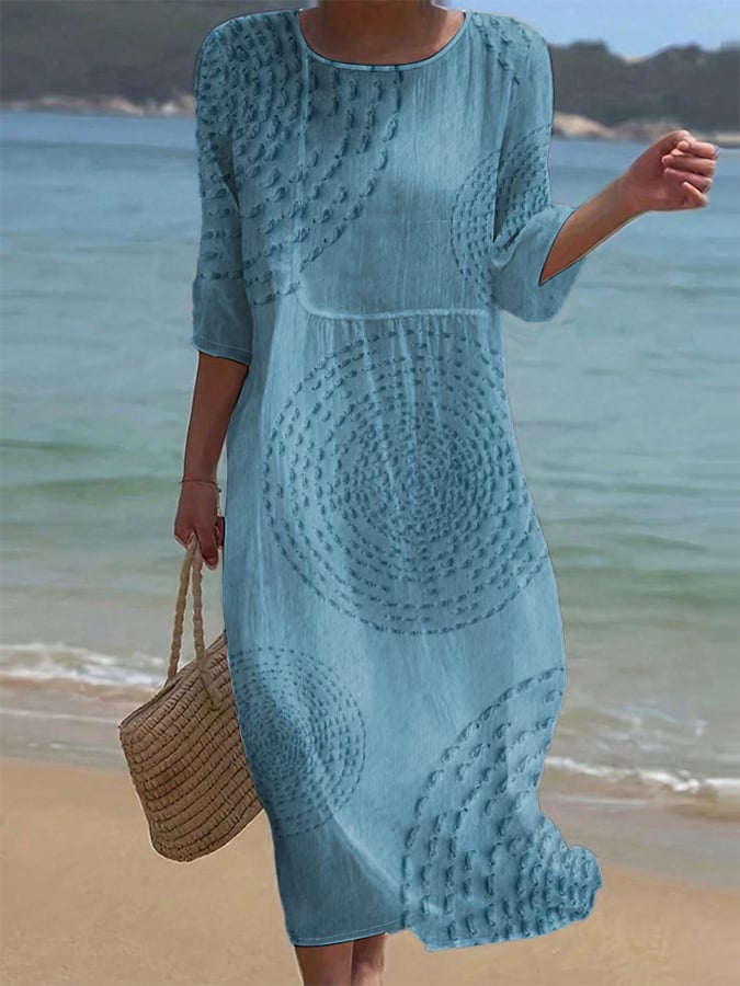 Blue textured casual midi dress in blue, full-length front view on the beach