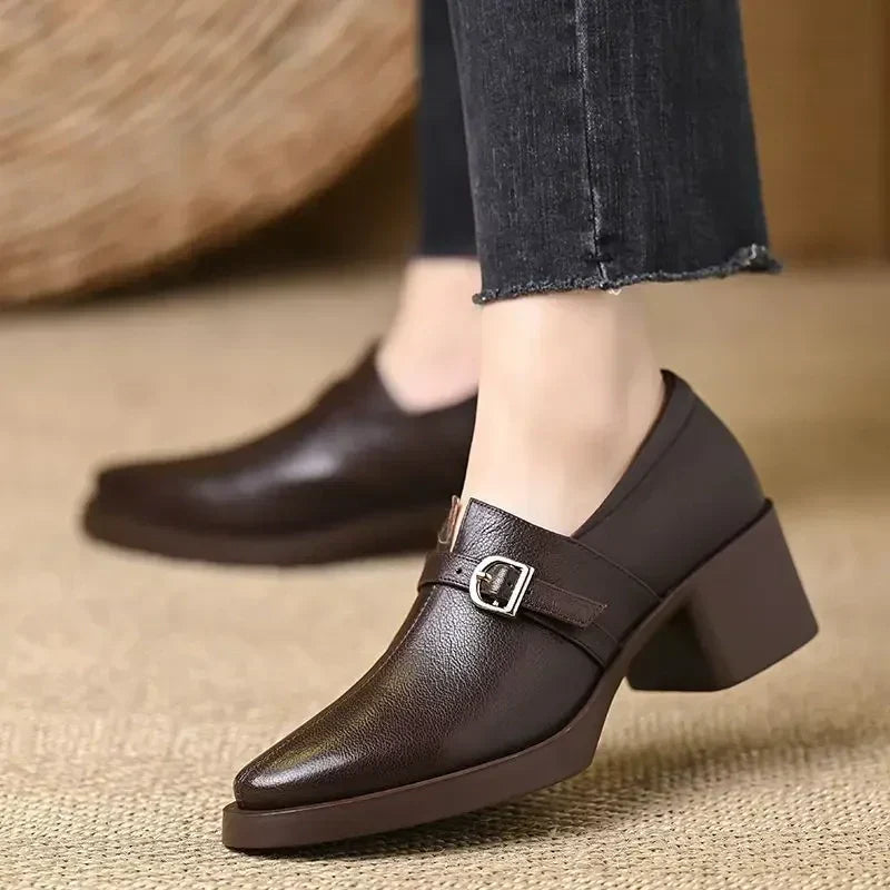 Celine block heels in brown, worn with cropped jeans, front view