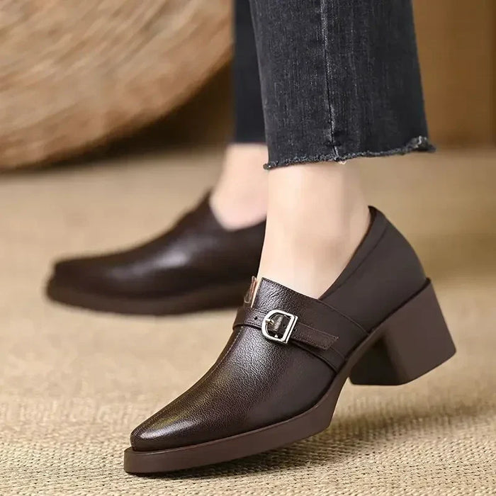 Celine block heels in brown, worn with cropped jeans, front view