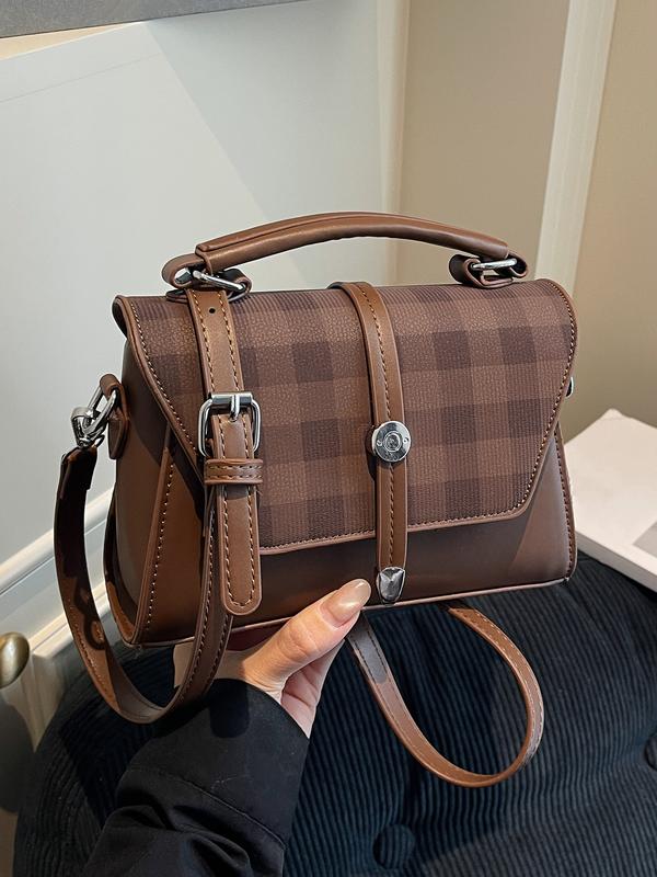 Alwina shoulder bag in brown check, angled view with top handle
