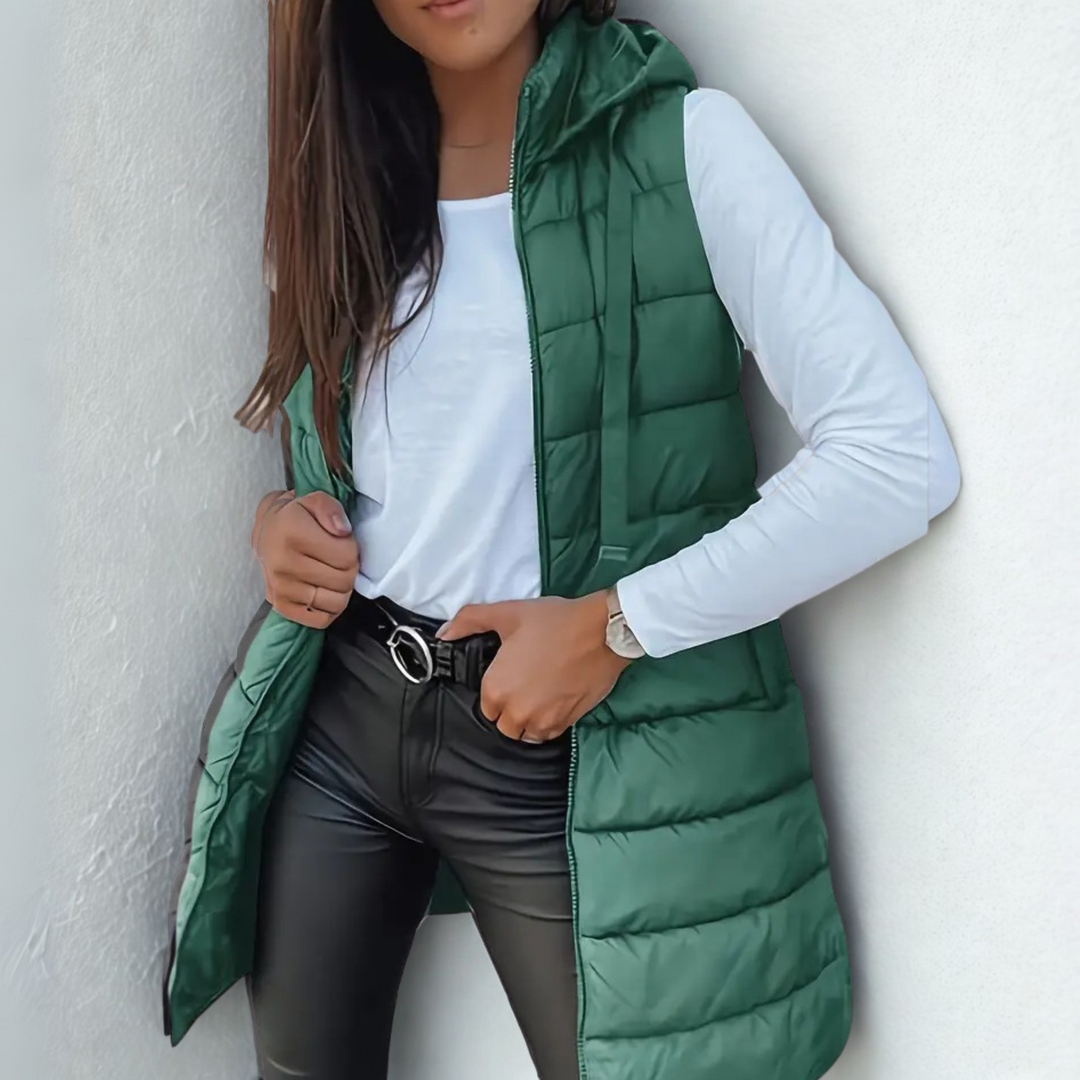 Eirlys hooded puffer vest in green, full-length front view