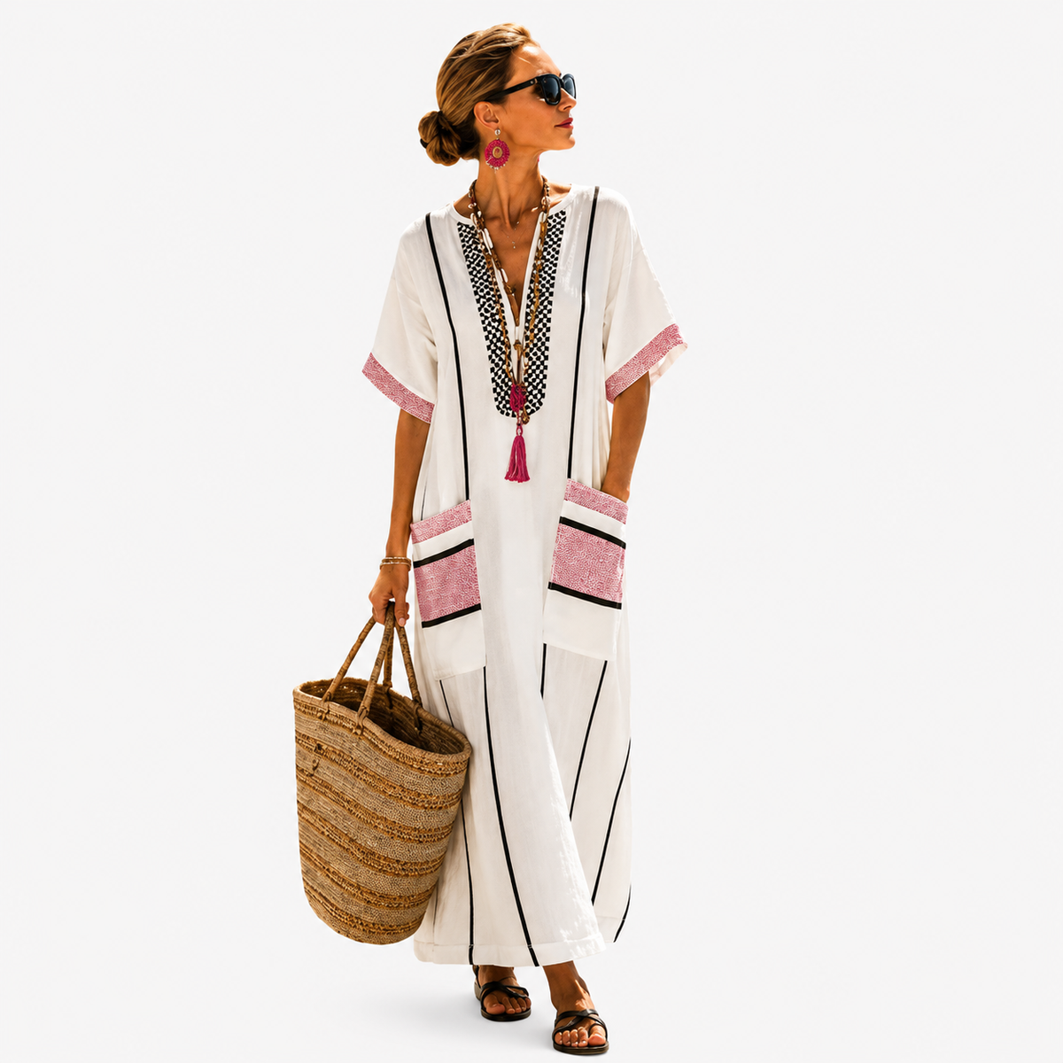 Long white kaftan with black stripes and pink pocket trim, full-length front view