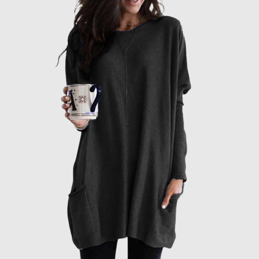 Fenora relaxed pocket tunic in black, full front view with front pockets