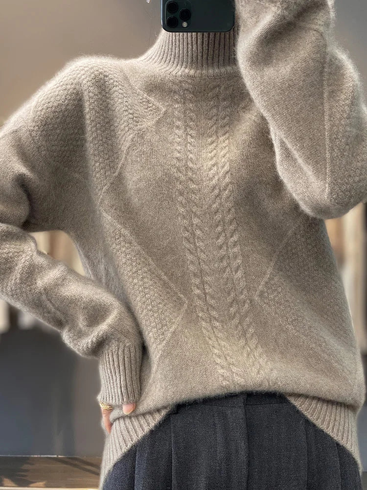 Vaesira cable-knit cashmere sweater in grey, front view worn with dark trousers