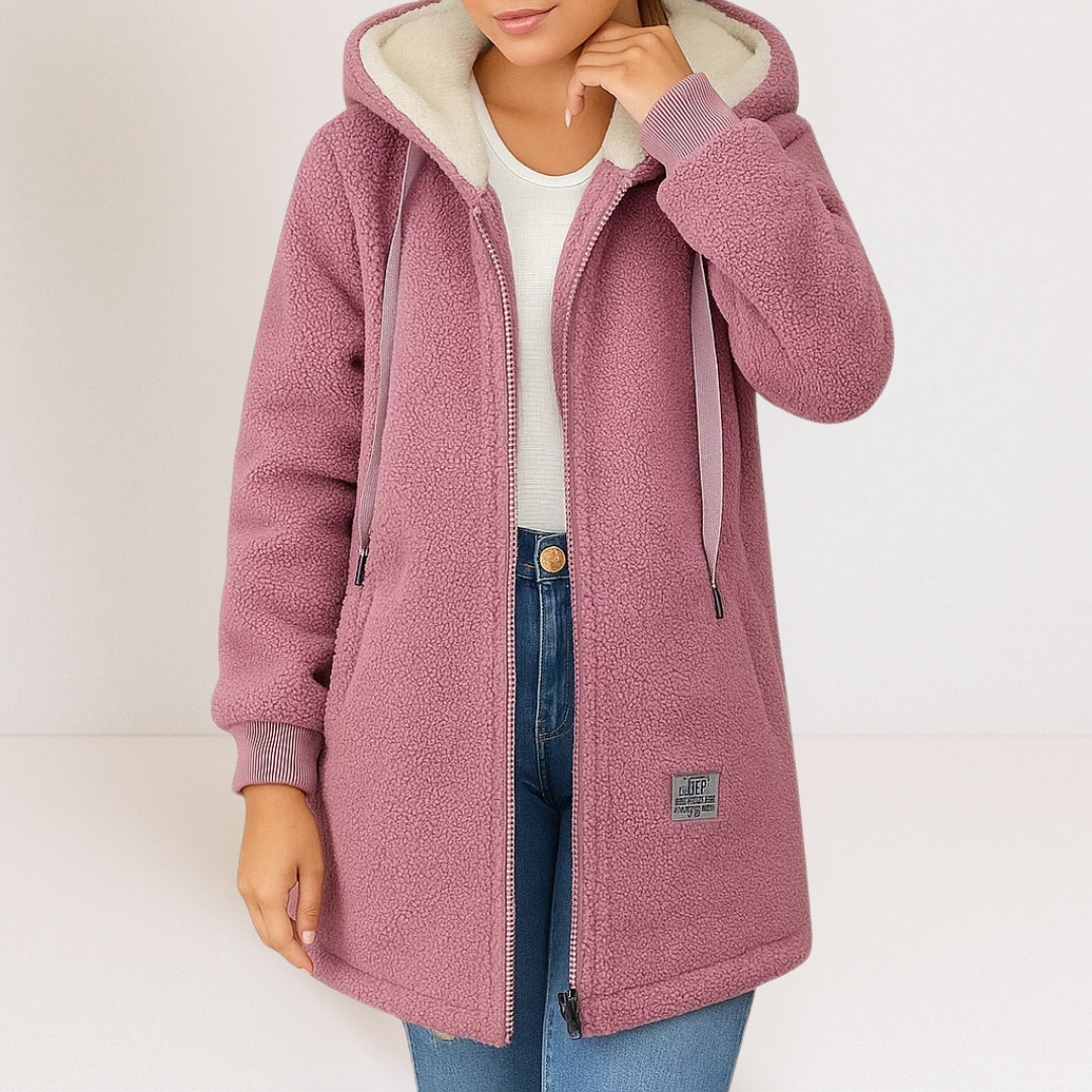 Thea longline hooded jacket in pink, worn open with jeans