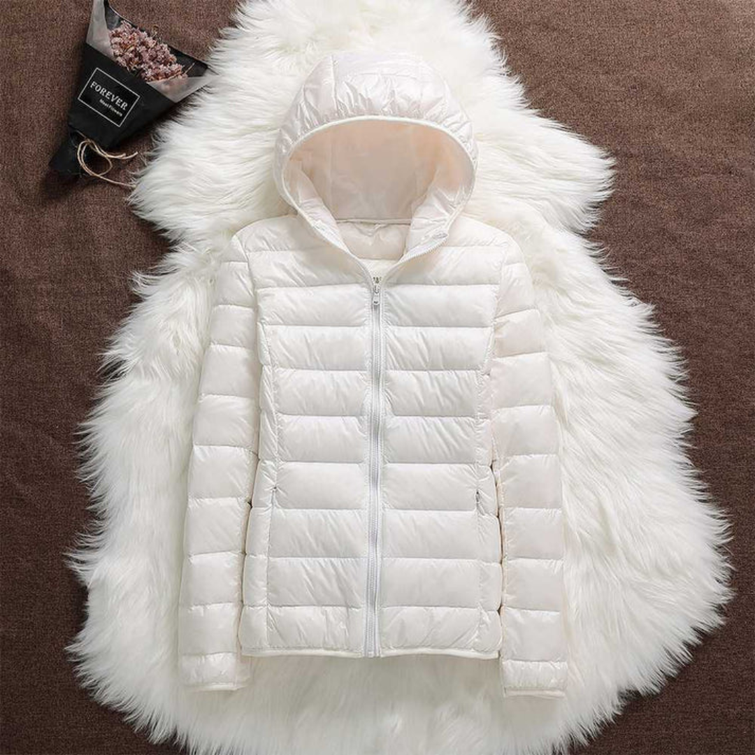 Metta padded jacket in white, flat lay showing hood and zip