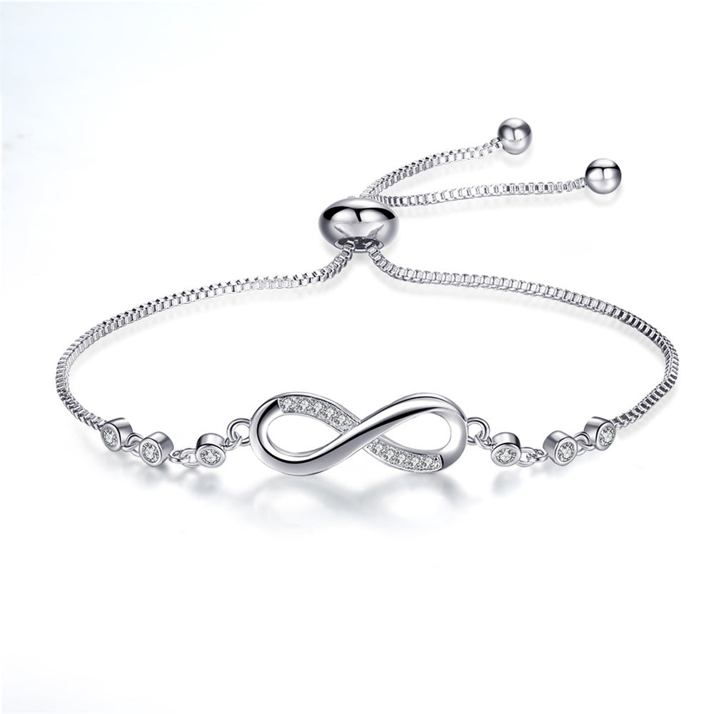 Infinity symbol bracelet in silver, full view with sliding bead clasp