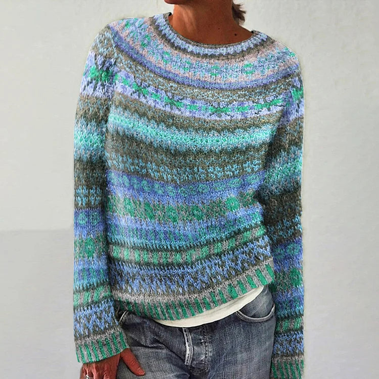 Diane retro Scandinavian knitted sweater in blue and green, front view with jeans