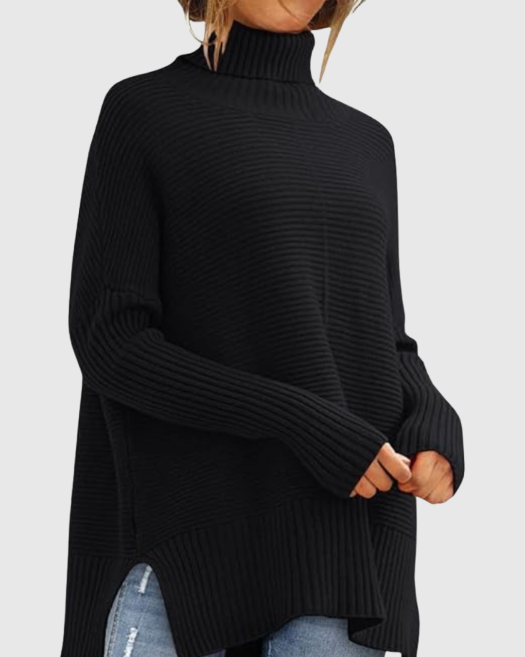 Aeronwen ribbed turtleneck knit jumper in black, front view worn with jeans