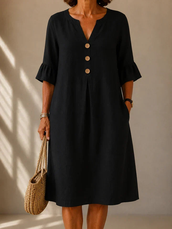 Charlotte buttoned gathered-front dress in black, front view