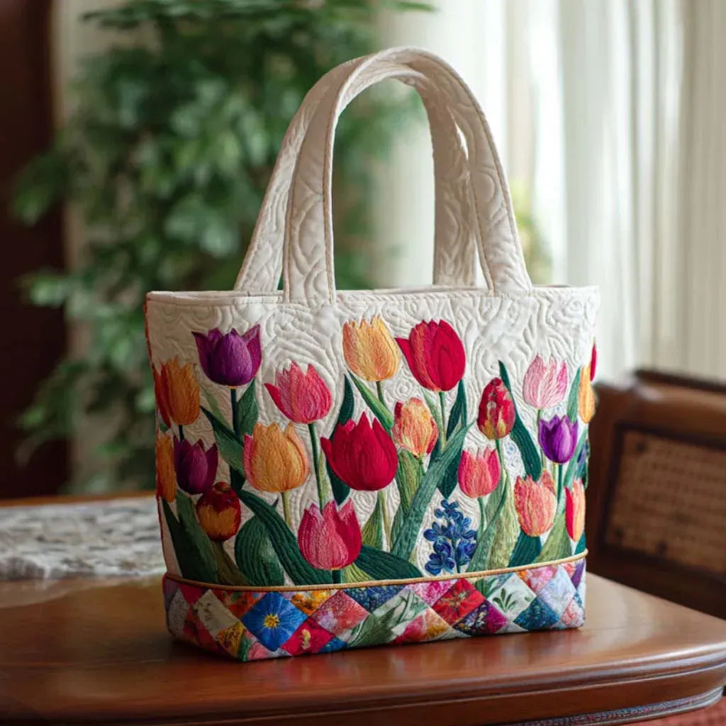 Handcrafted tulip garden tote bag in cream, standing upright side view