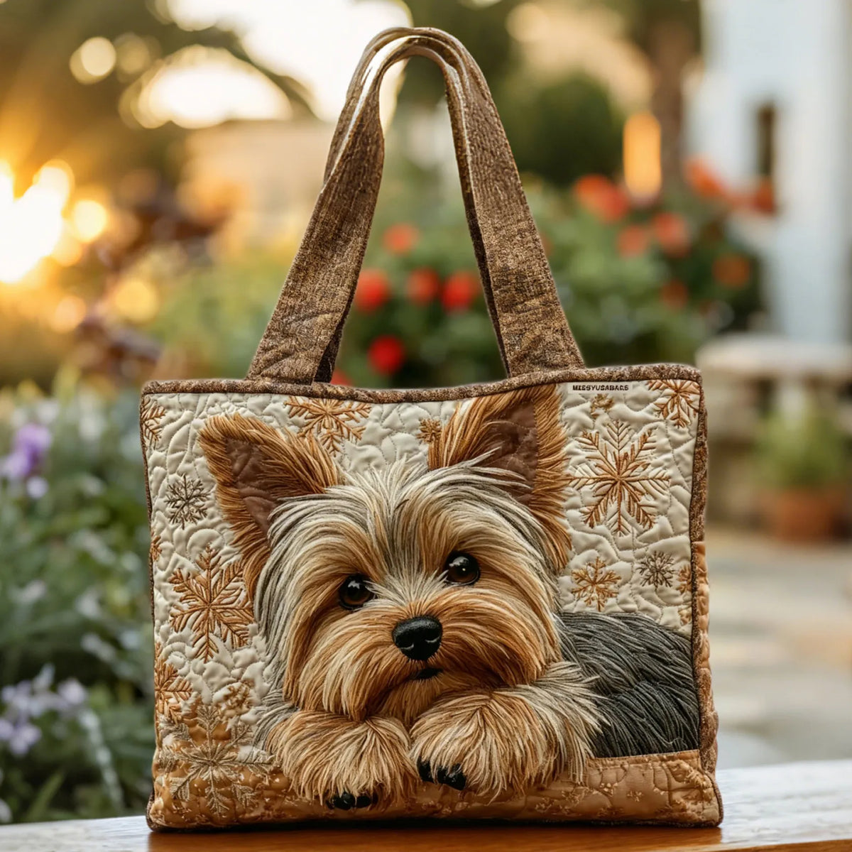 Handcrafted quilted tote bag with Yorkshire Terrier print in cream and brown, front view