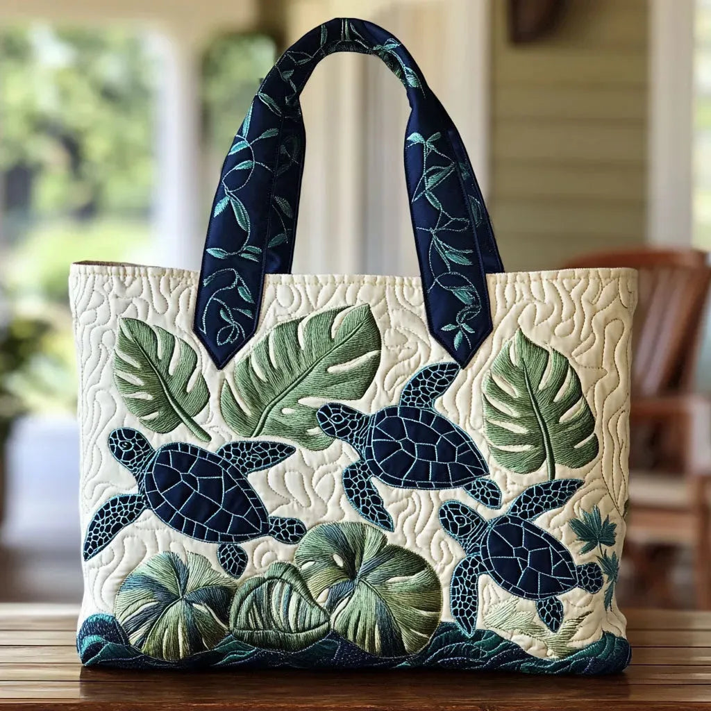 Handcrafted sea turtle tote bag in cream, navy and green, front view