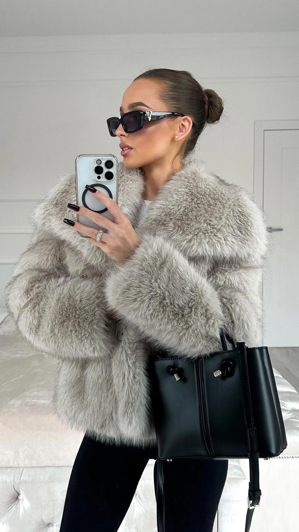 Fiorina faux fur jacket in grey, worn three-quarter mirror view