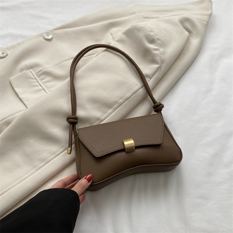 Cécile mini shoulder bag in brown, front view