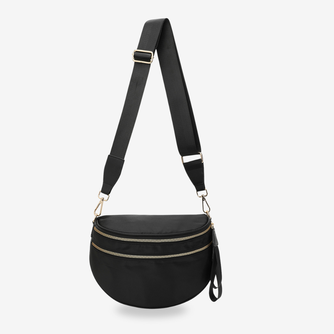 Dionne crossbody bag in black, front view with adjustable strap