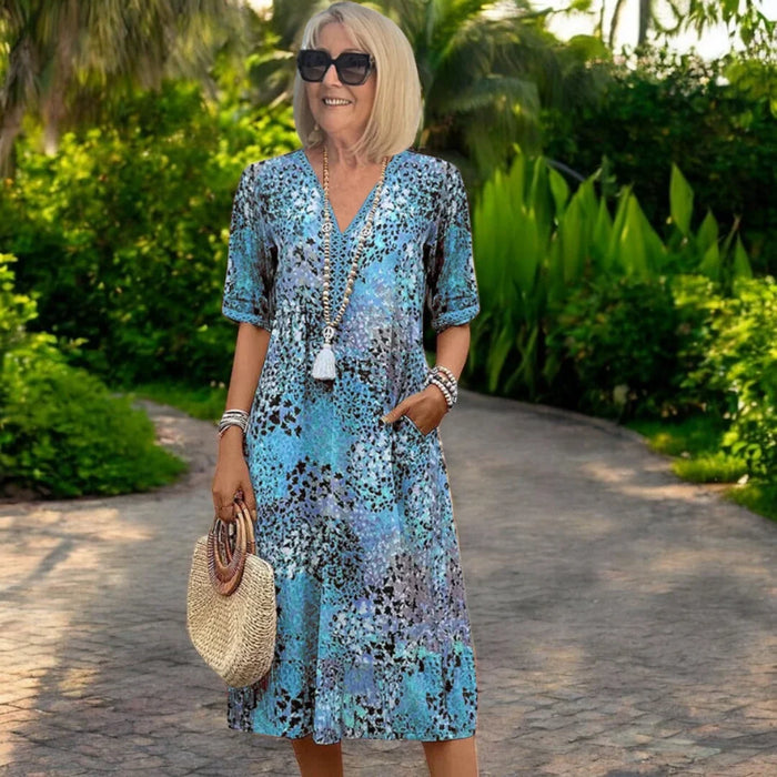Iris lightweight flowing dress in blue print, full-length front view