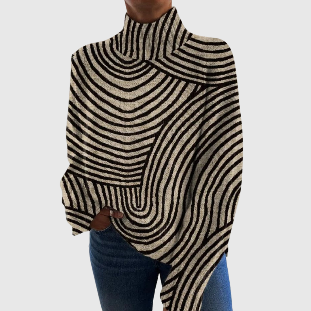 Handcrafted line knit turtleneck sweater in black and cream, front view worn with jeans