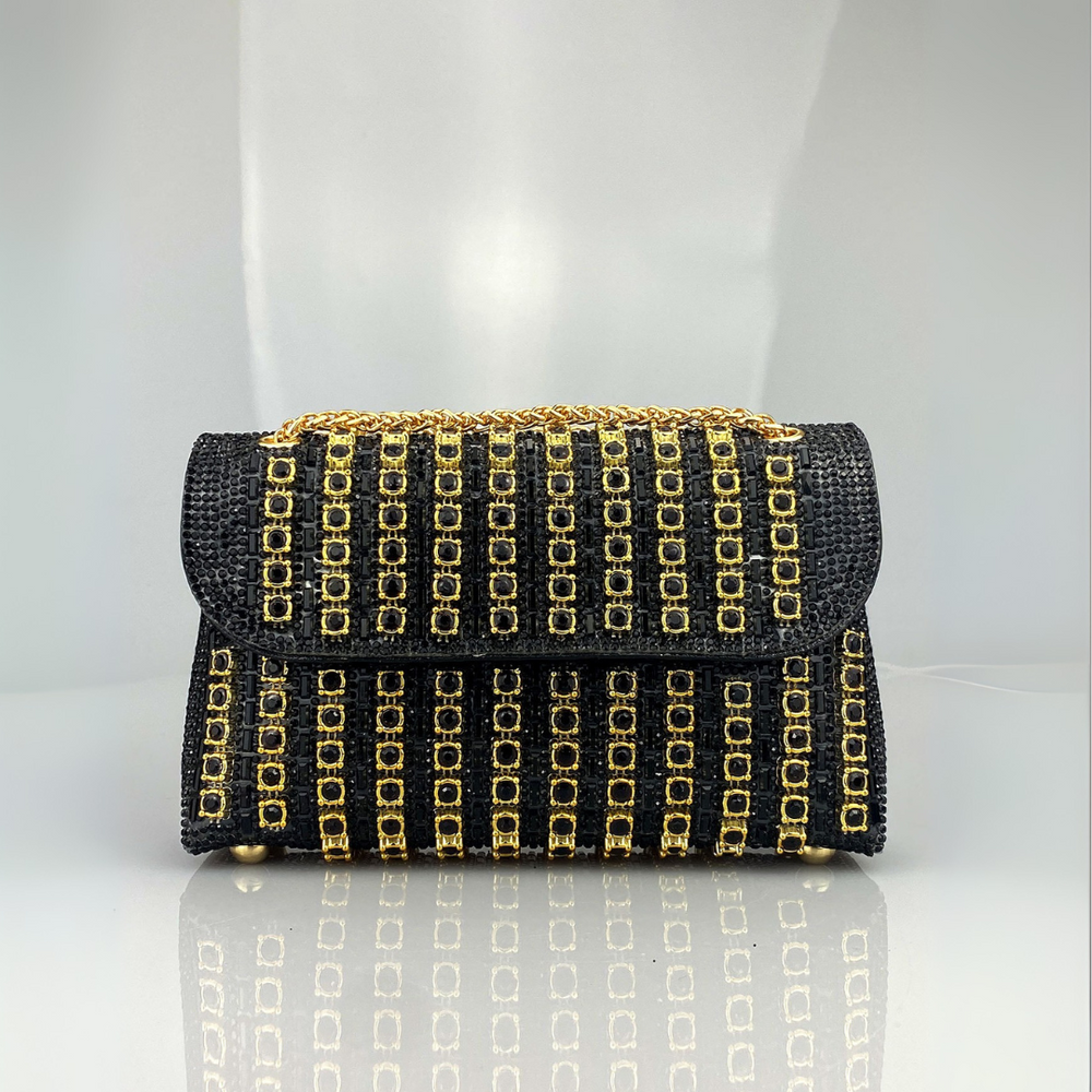 Klaudia chain diamond shoulder bag in black and gold, front view