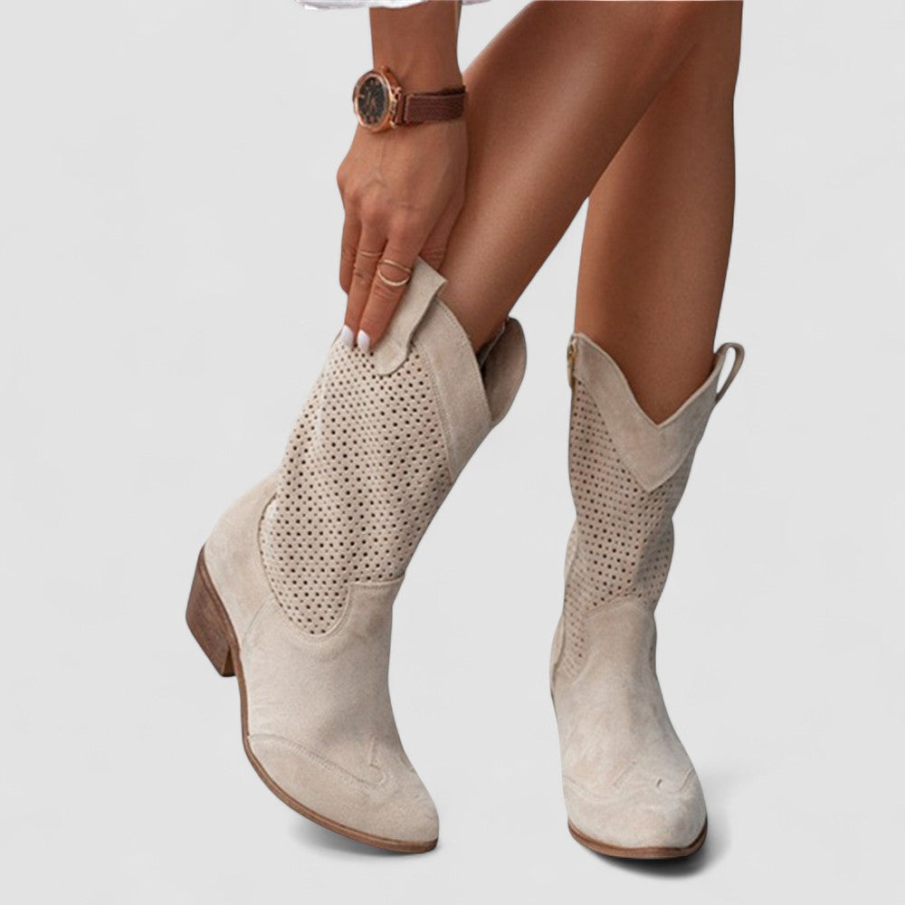 Quinn perforated Western boots in beige, worn front view