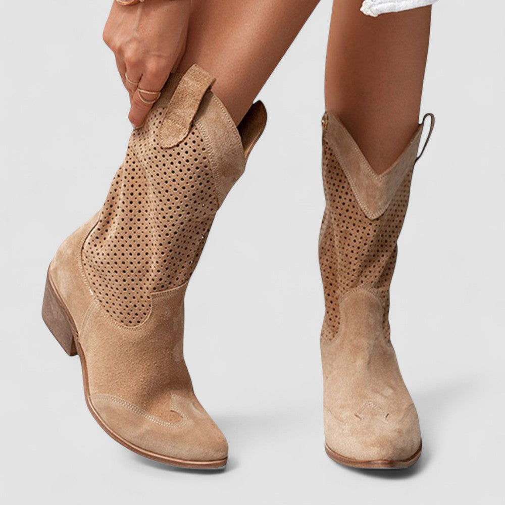 Quinn perforated Western boots in brown, worn side view