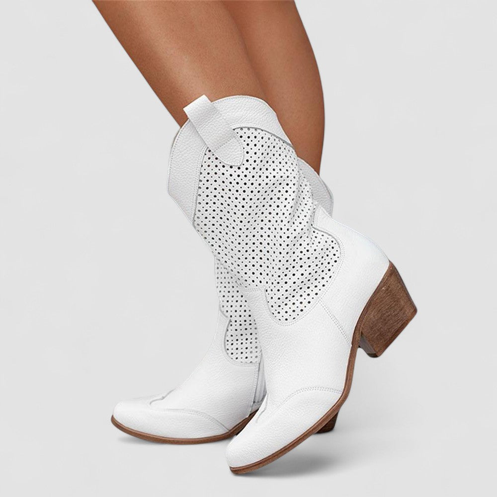 Quinn perforated Western boots in white, angled front view