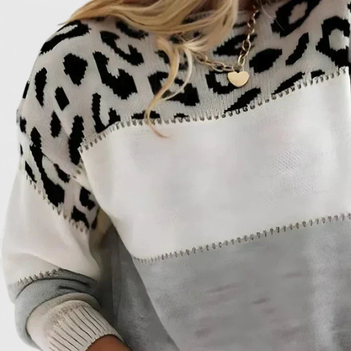 Marizelina sweater in grey, close-up of leopard shoulder panel
