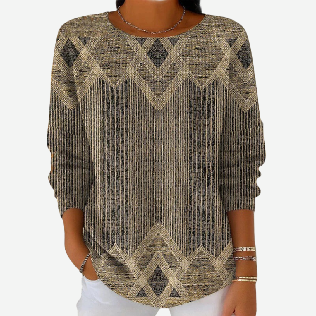 Aunea sophisticated sweater in gold and charcoal chevron print, front close-up