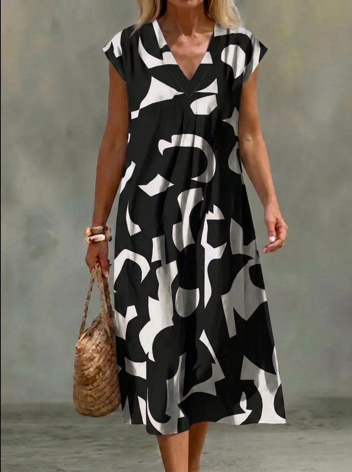 Elena printed midi dress in black and white, full-length front view