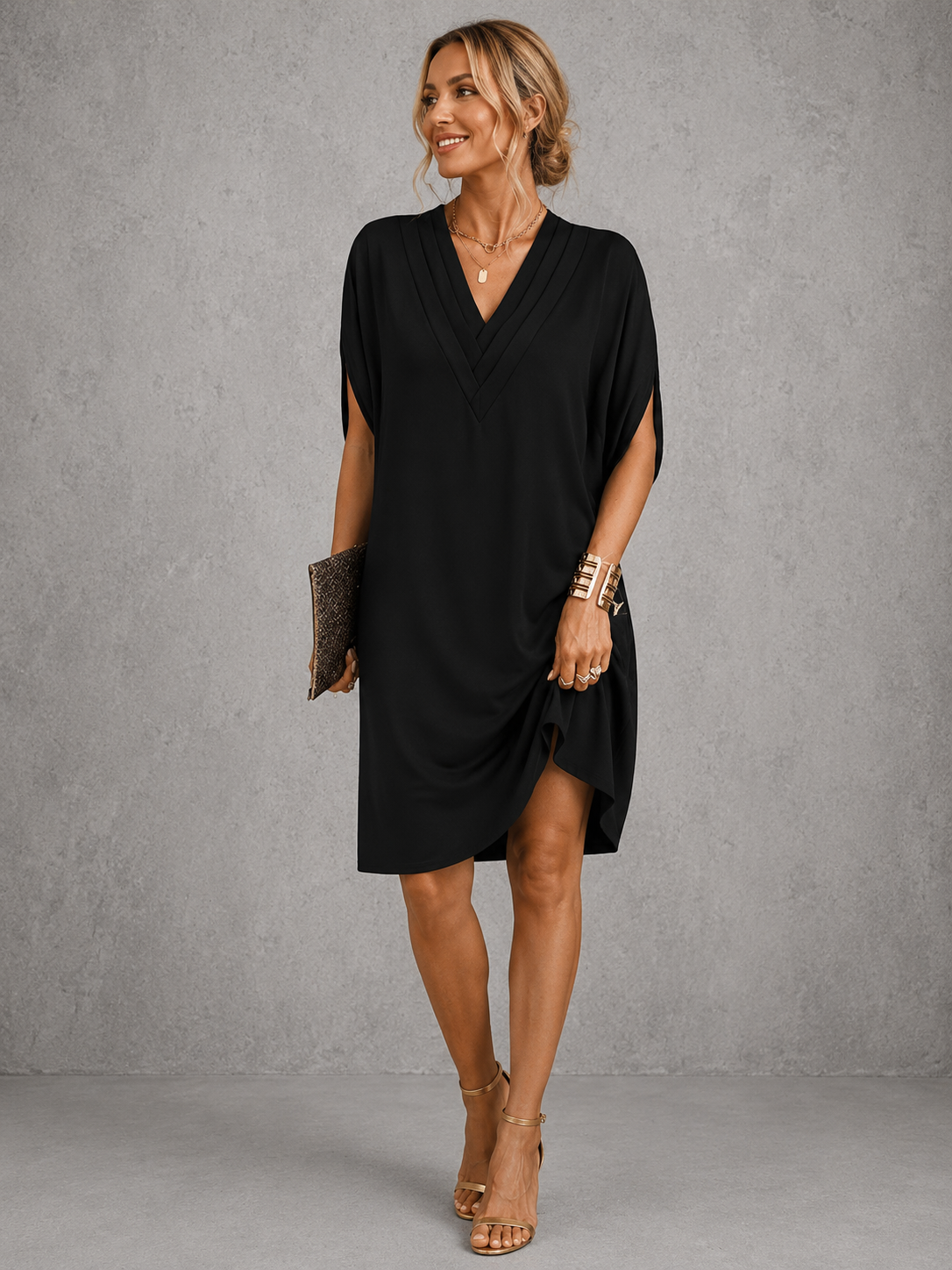 Seren pleated V-neck shift dress in black, full-length front view