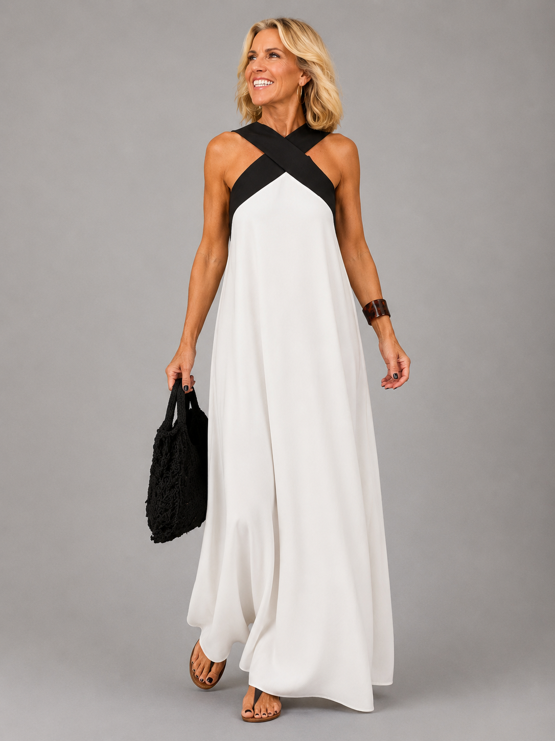 Edie halter maxi dress in white with black neckline band, full-length front view