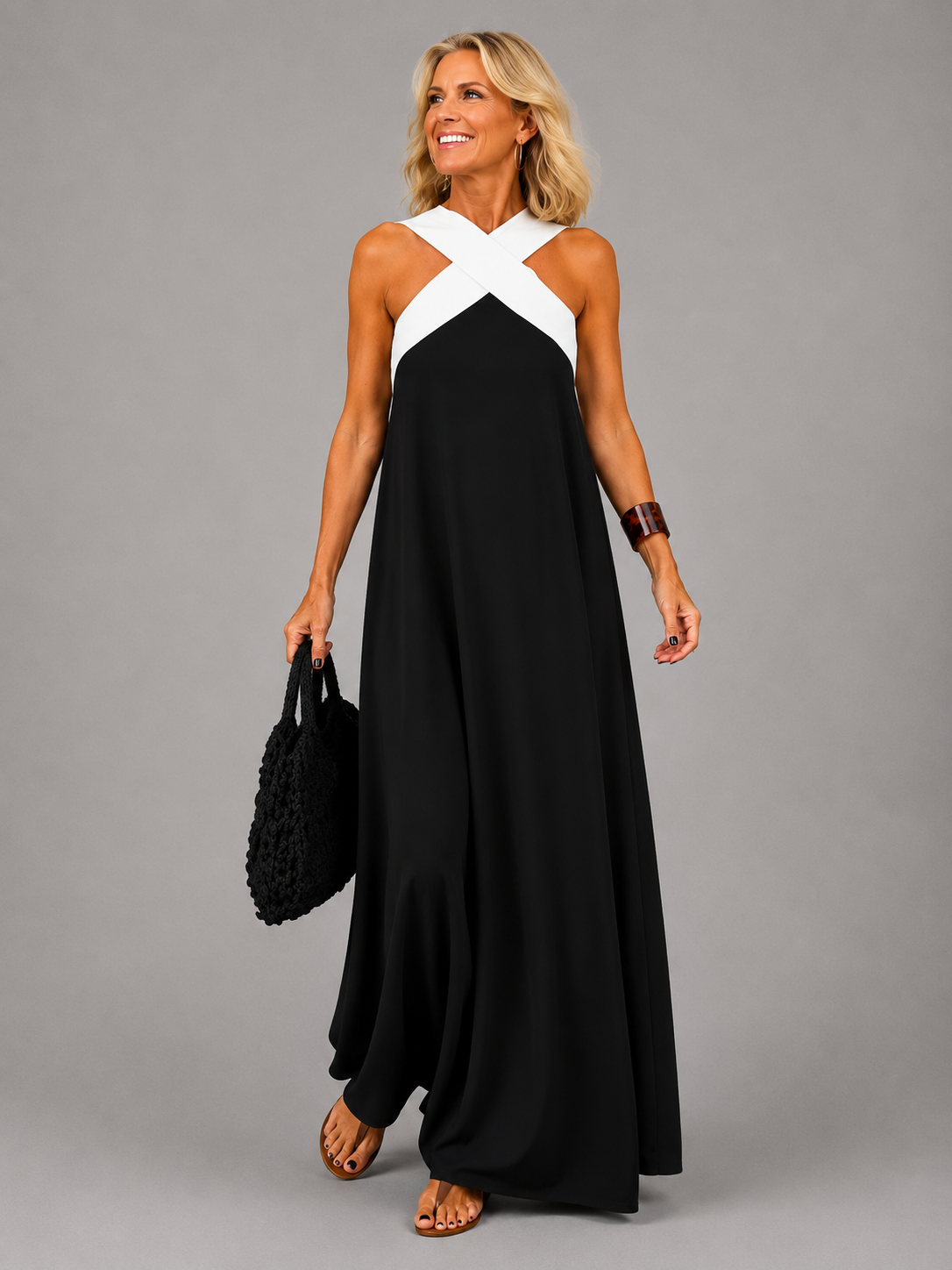 Edie halter maxi dress in black with white neckline band, full-length front view