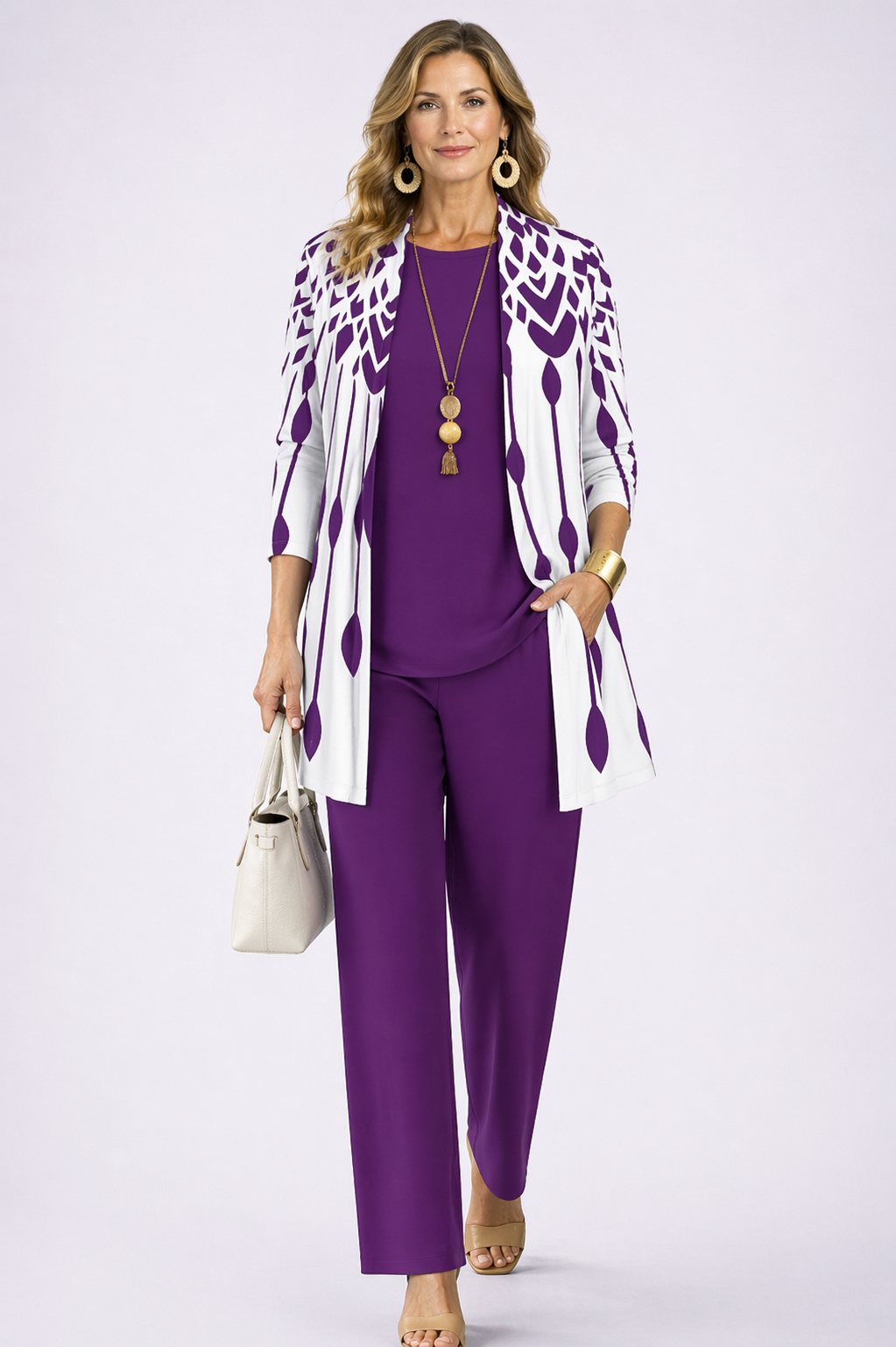 Elaine printed cardigan, top and trousers in purple and white, worn front view