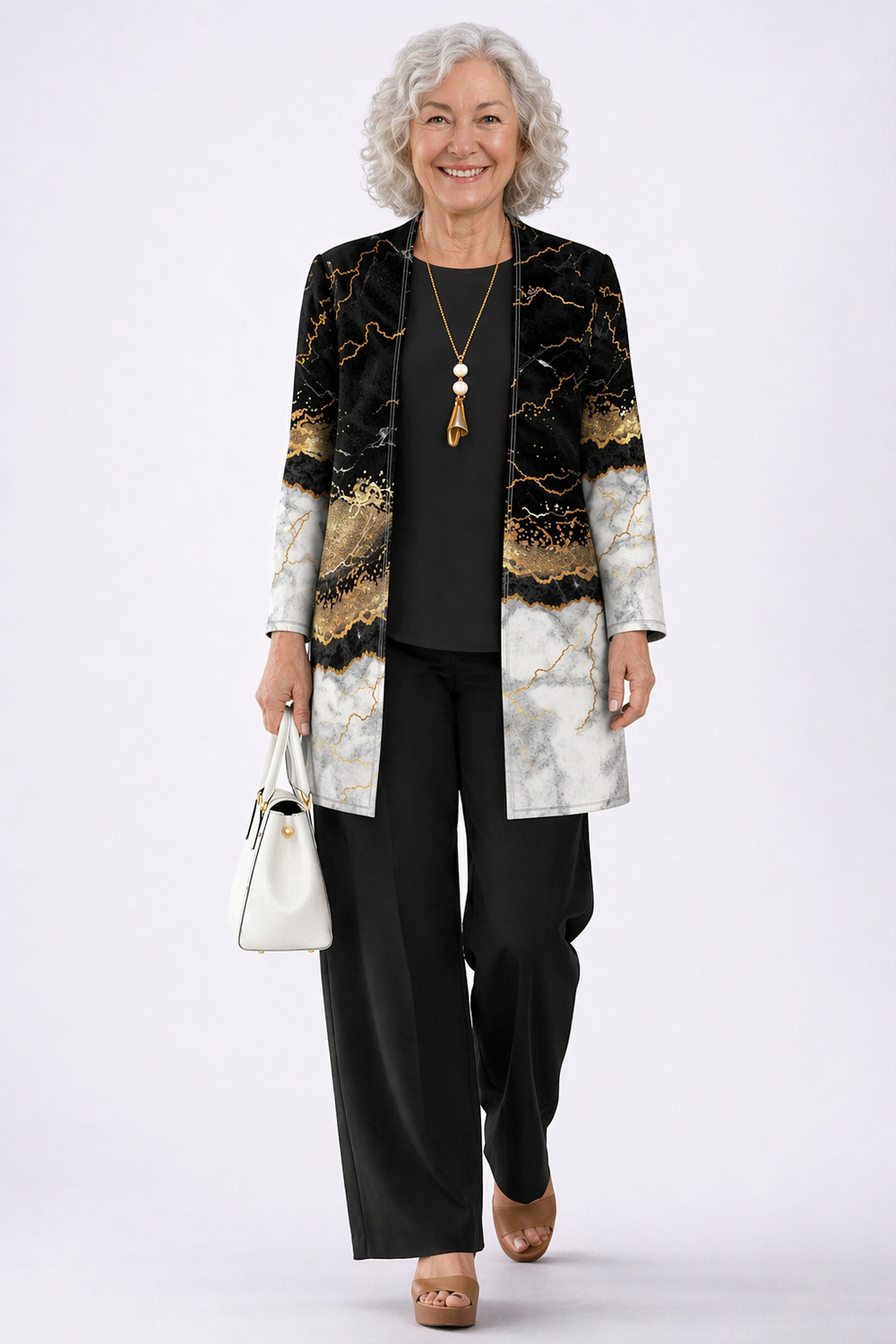 Yvonne three-piece set with black and gold marble print cardigan, black top and wide-leg trousers, front view