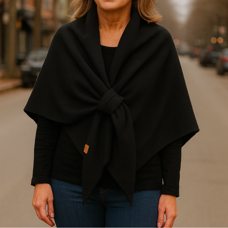 Averil knit shoulder scarf in black, worn front view outdoors