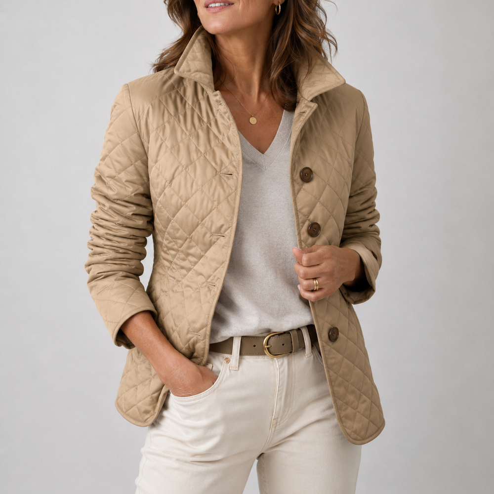 Kelley lightweight quilted jacket in beige, worn open over a jumper