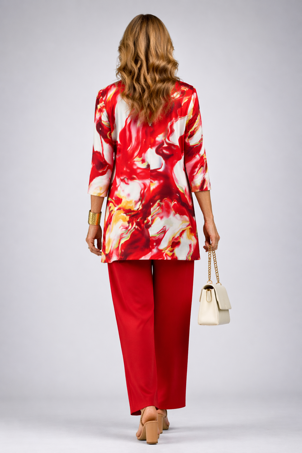 Gelsey three-piece set in red, back view of longline printed jacket and trousers
