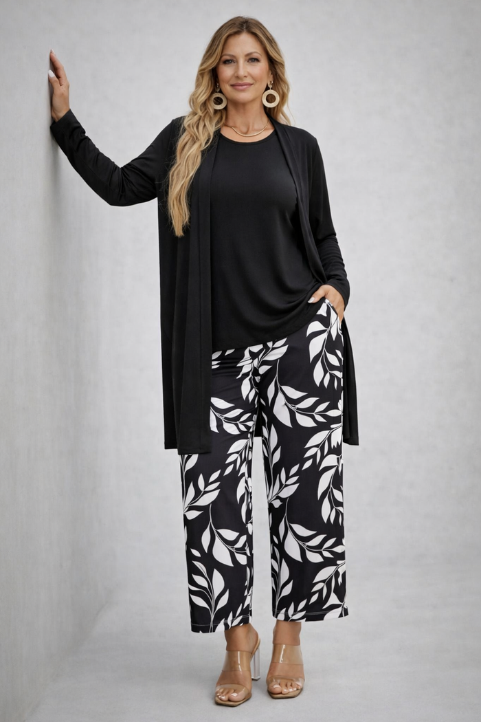 Eponine three-piece set in black with leaf-print trousers, front view