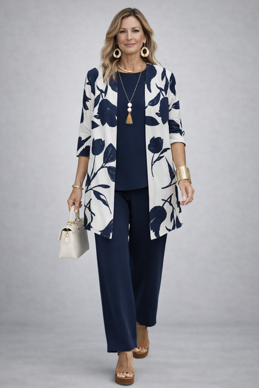 Evania three-piece set with navy floral cardigan and navy trousers, front view