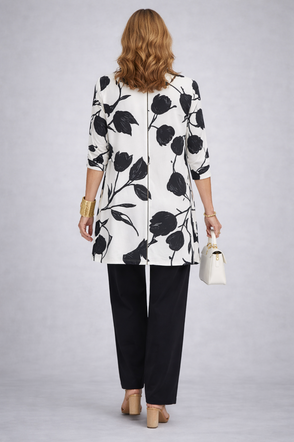 Etheline three-piece set, back view of the ivory and black floral longline cardigan