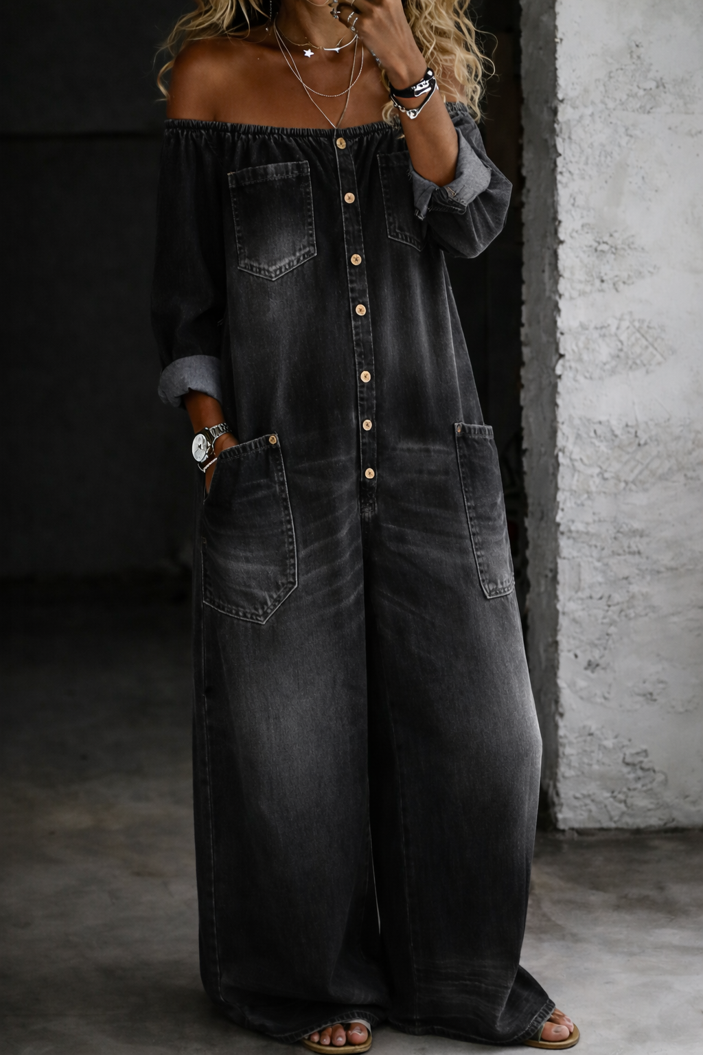 Elena off-shoulder denim jumpsuit in black, full-length front view
